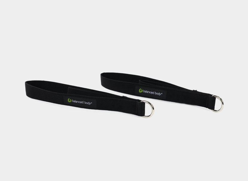 Black double loops pair by Balanced Body for versatile Pilates workouts. Cotton D-ring Loops | caption::Cotton D-Ring Double Loops