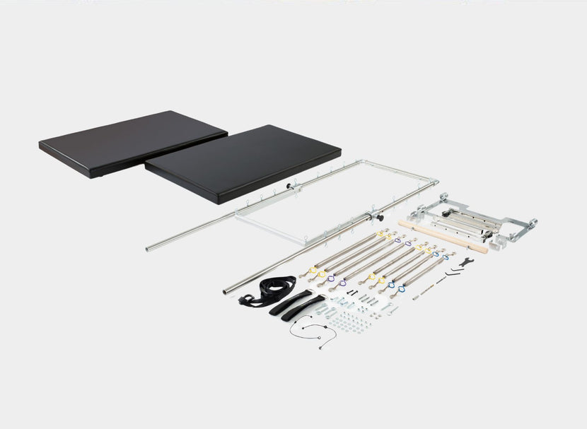 Tower retrofit kit for studio reformer on white background
