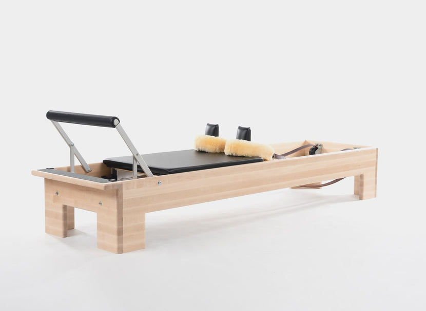 Ron Fletcher Reformer designed for advanced Pilates exercises.